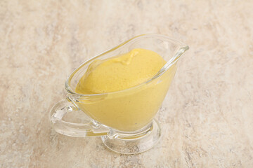 Organic mustard sauce in the bowl