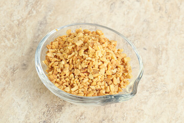 Crunched roasted peanut in the bowl