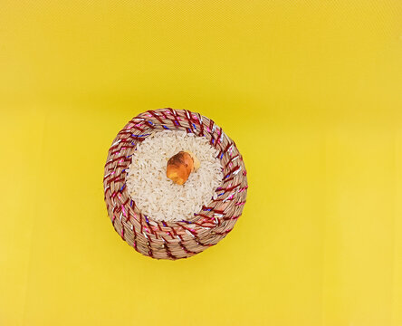 Kusha grass made pot with rice and ginger