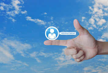 Businessman with magnifying glass flat icon on finger over blue sky with white clouds, Business recruitment concept