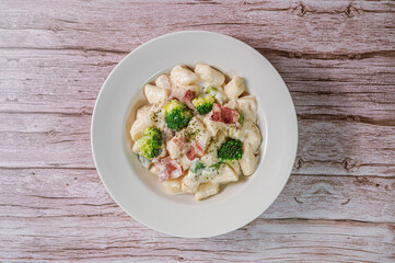 Korean food Spicy Stir-fried Carbonara tteokbokki dish on white plate