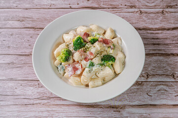 Korean food Spicy Stir-fried Carbonara tteokbokki dish on white plate