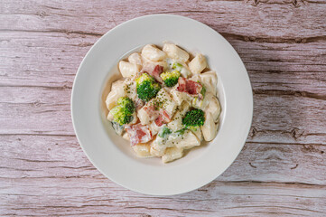 Korean food Spicy Stir-fried Carbonara tteokbokki dish on white plate