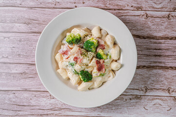 Korean food Spicy Stir-fried Carbonara tteokbokki dish on white plate