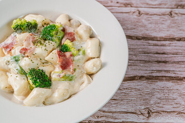 Korean food Spicy Stir-fried Carbonara tteokbokki dish on white plate