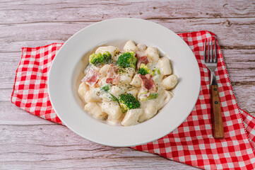 Korean food Spicy Stir-fried Carbonara tteokbokki dish on white plate