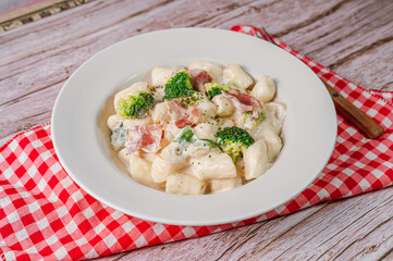 Korean food Spicy Stir-fried Carbonara tteokbokki dish on white plate