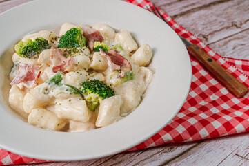 Korean food Spicy Stir-fried Carbonara tteokbokki dish on white plate