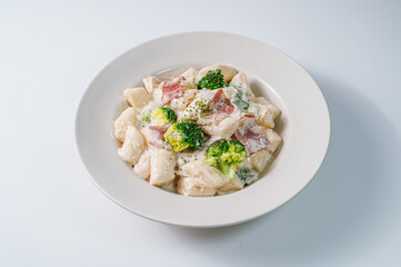 Korean food Spicy Stir-fried Carbonara tteokbokki dish on white plate