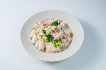 Korean food Spicy Stir-fried Carbonara tteokbokki dish on white plate