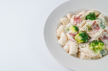 Korean food Spicy Stir-fried Carbonara tteokbokki dish on white plate