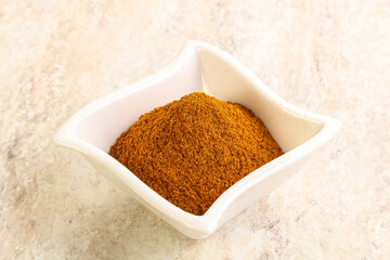 Dry Paprika powder in the bowl