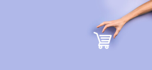 Businessman man holding shopping cart trolley mini cart in business digital payment interface.Business, commerce and shopping concept