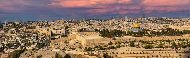 Fototapeta na wymiar Metropolitan Jerusalem panorama with Temple Mount, Al-Aqsa Mosque and Dome of the Rock in Old City seen from Mount of Olives in Israel