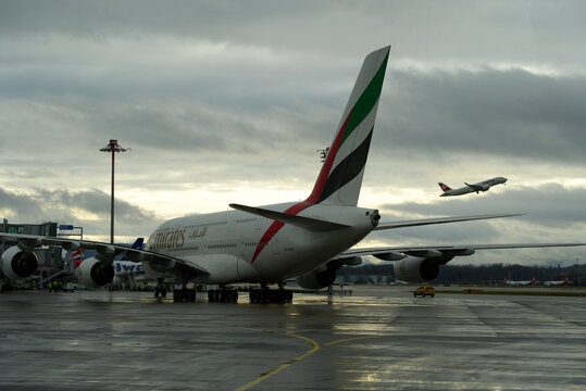 Emirates Airline Airbus A380 register A6-EOZ taxiing at Zürich Airport on a rainy winter afternoon. Photo taken December 26th, 2021, Zurich, Switzerland.