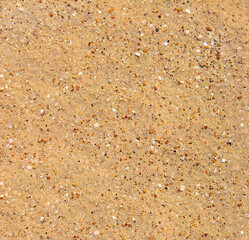 Nature background - Rippled sand with small stones and seashells on the bottom of Aral Sea in Uzbekistan