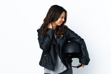 Young woman holding a motorcycle helmet over isolated white background with neckache