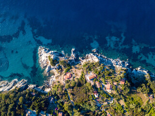 Aerial drone panorama view of the coast line, beach and crystal clear water of elba close to...
