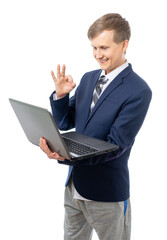 A young businessman leads an online meeting at a computer in home shorts. Stay at home while quarantined while the world is in pandemic or epidemic of the virus. Isolated on a white background.