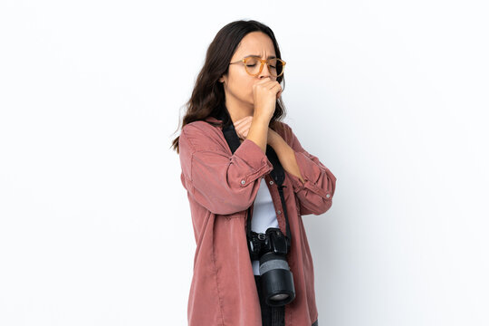 Young photographer woman over isolated white background coughing a lot