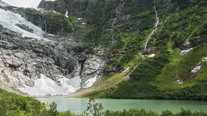 Jostedalsbreen National Park, Sogn Og Fjordane County, Norway. Boyabreen Glacier In Spring Sunny Day. Famous Norwegian Landmark And Popular Destination.