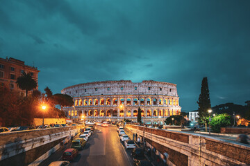 Rome, Italy. Colosseum Also Known As Flavian Amphitheatre In Evening Or Night Time