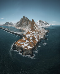 Drone view of a snow covered Eystrahorn mountain in Iceland at Hvalnes peninsula