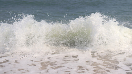 beautiful beach and sea waves and water droplets