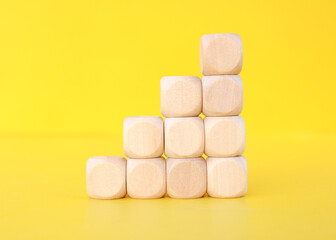 Hand holding wooden cube on, mockup, template, copy space for text