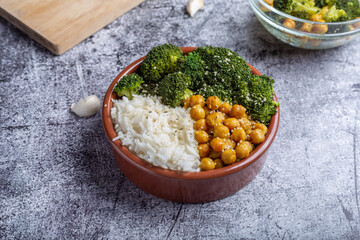 Bowl with chickpeas and basmati rice. Tasty complete vegan food.