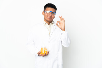 Young Ecuadorian scientific man showing ok sign with fingers