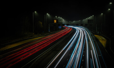 Fototapeta na wymiar Motorway fast traffic light trails at night 