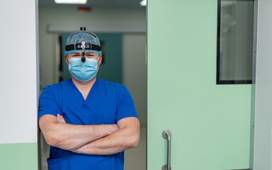 Obraz na płótnie Canvas Professional doctor in unform. Medical specialist in mask in modern hospital.