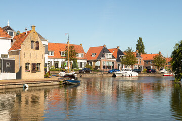 Fototapeta na wymiar Village view of the picturesque Frisian town of Makkum on the IJsselmeer.