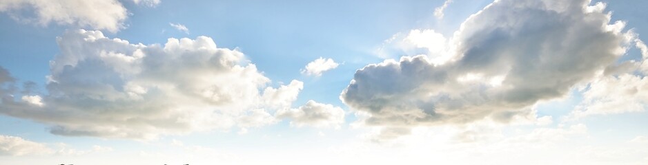 Clear blue sky after the storm. Soft sunlight. Panoramic image, texture, background, graphic...