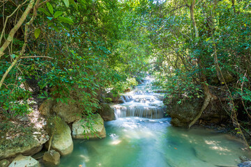Erawan National Park  in Thailand. Erawan Waterfall is a popular tourist destination and famous for...