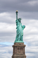 Fototapeta na wymiar Statue of Liberty on a cloudy winter day, New York City, USA