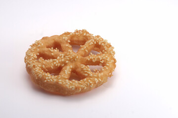 Shaking flower (kembang goyang) cake traditional from indonesia,Made from flour, sugar, milk, and baking powder.cake on white background 
