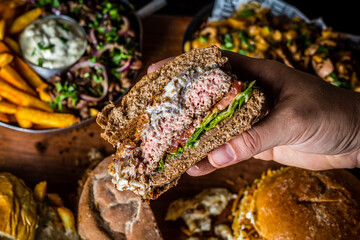 Perfect Burger Classic Bacon Homemade Artisan Tomato Sauce Sausage Melted Cheese Milk Shake Onion Chicken Meat Pasta Shrimp Restaurant Menu Gourmet on a wooden table