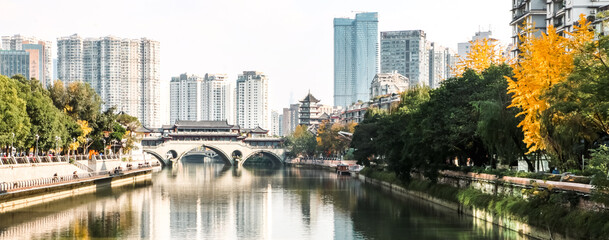 The traditional Anshun Bridge over the Jinjiang River running through Chengdu, a beautiful mega...