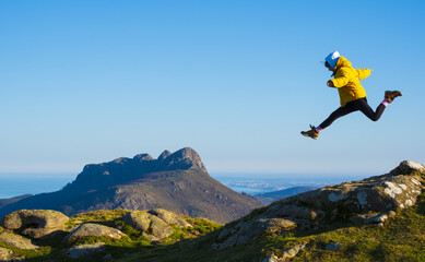 Girl playing sports in Aiako Harriak Nature Park, Euskadi