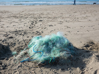 tangled fishing nets  symbol of pollution and sealife problems - 477758774