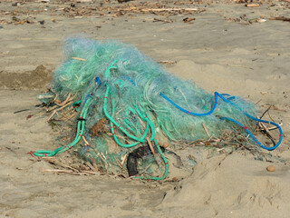 tangled fishing nets  symbol of pollution and sealife problems - 477758781