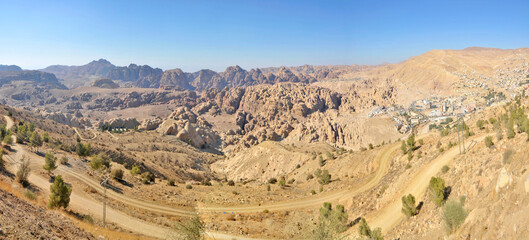 View of the mountains hiding the rocky town of Petra 