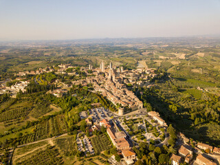 Aerial/Drone panorama of San Gimignano in the tuscany and its vineyards and olive trees, Tuscany Italy	