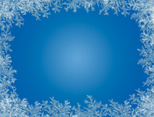 Frosty frame. Decorative ice crystals frame on blue background