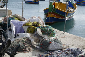 Fishing boats and nets in Marsaxlokk 