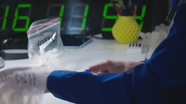 production of dentures. A factory employee marks teeth on a 3D printer. dentistry using modern technologies. building industrial capabilities into medicine