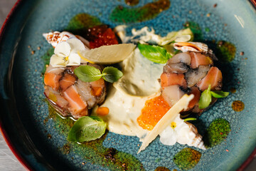 The chef added some sauce to the dish and the dish is finished now.