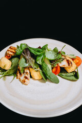 A plate of the food is served to new people who arrived to the restaurant.